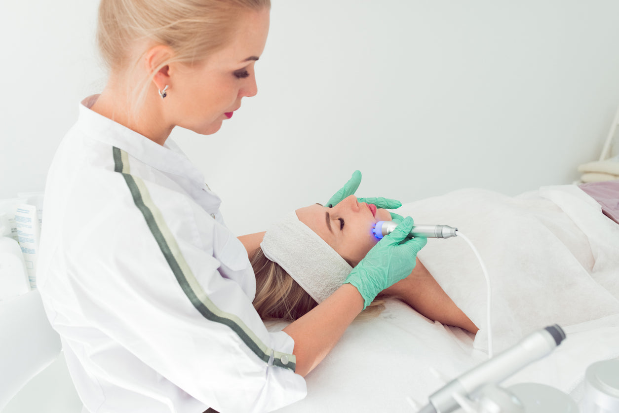 Young woman in cosmetology clinic. Rf skin tightening